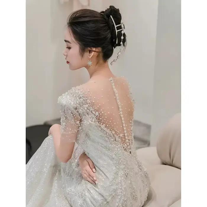 Robe de mariée en queue de poisson