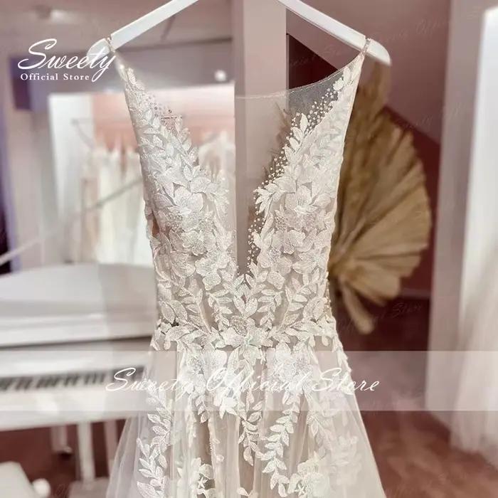 Robe de mariée en organza avec perles brodées