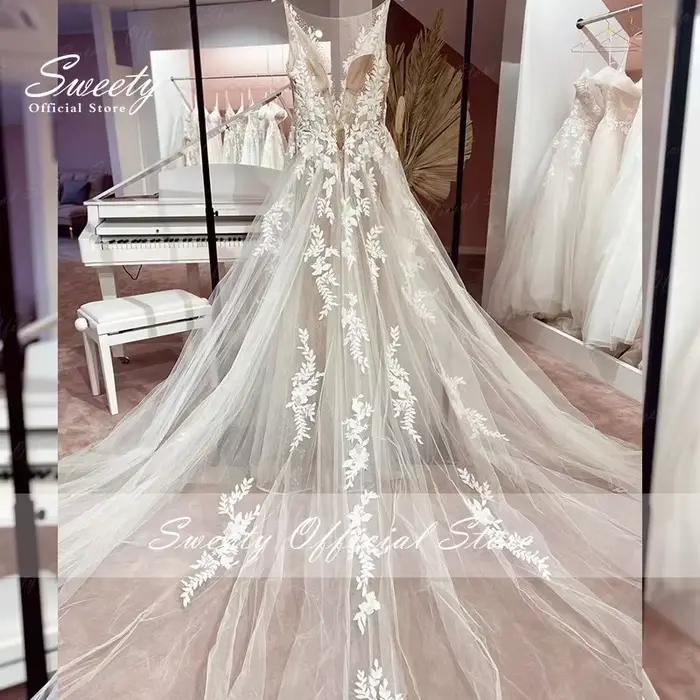 Robe de mariée en organza avec perles brodées