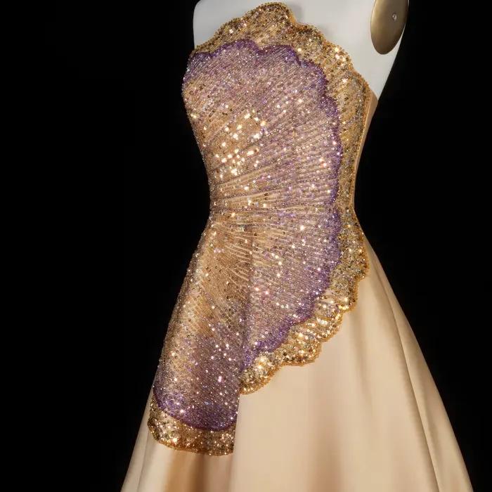 Robe de soirée trapèze sans bretelles Sharon Said Dubai Luxury Gold avec gants perlés شارون سعيد