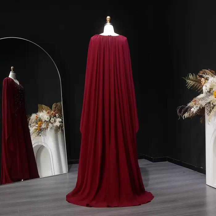 Robe de soirée Sharon Said bleu marine perlée à col en V avec cape en mousseline de soie coupe trapèze شارون سعيد
