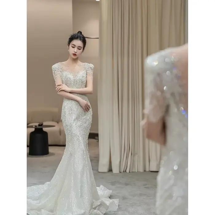Robe de mariée en queue de poisson