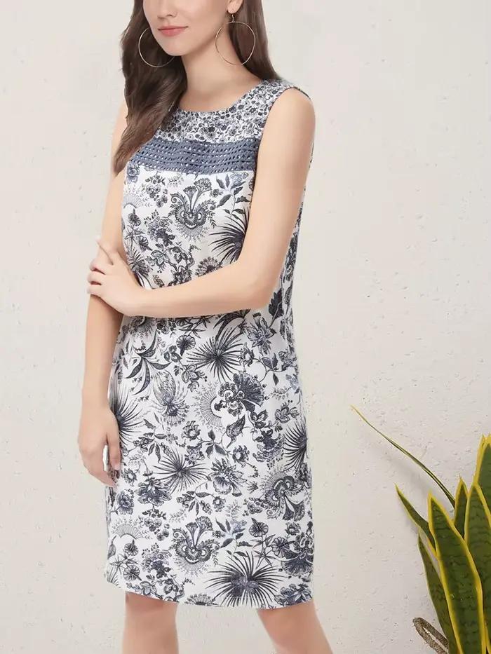 Robe d'été sans manches style resort avec poches 2026