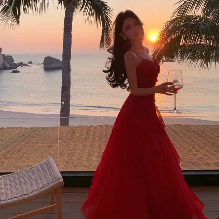 Robe longue à volants en tulle à bretelles spaghetti pour femmes