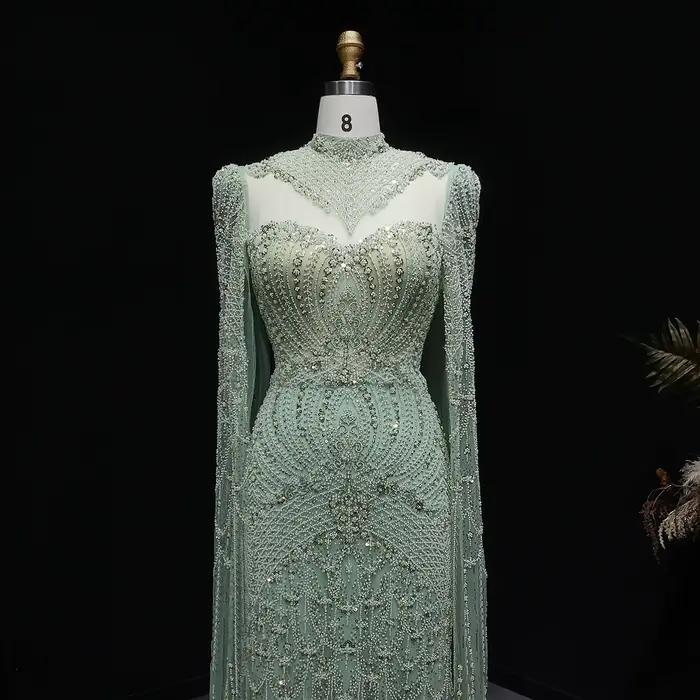 Robe de soirée Sharon Said Dubai Green à col montant avec manches cape et perles شارون سعيد