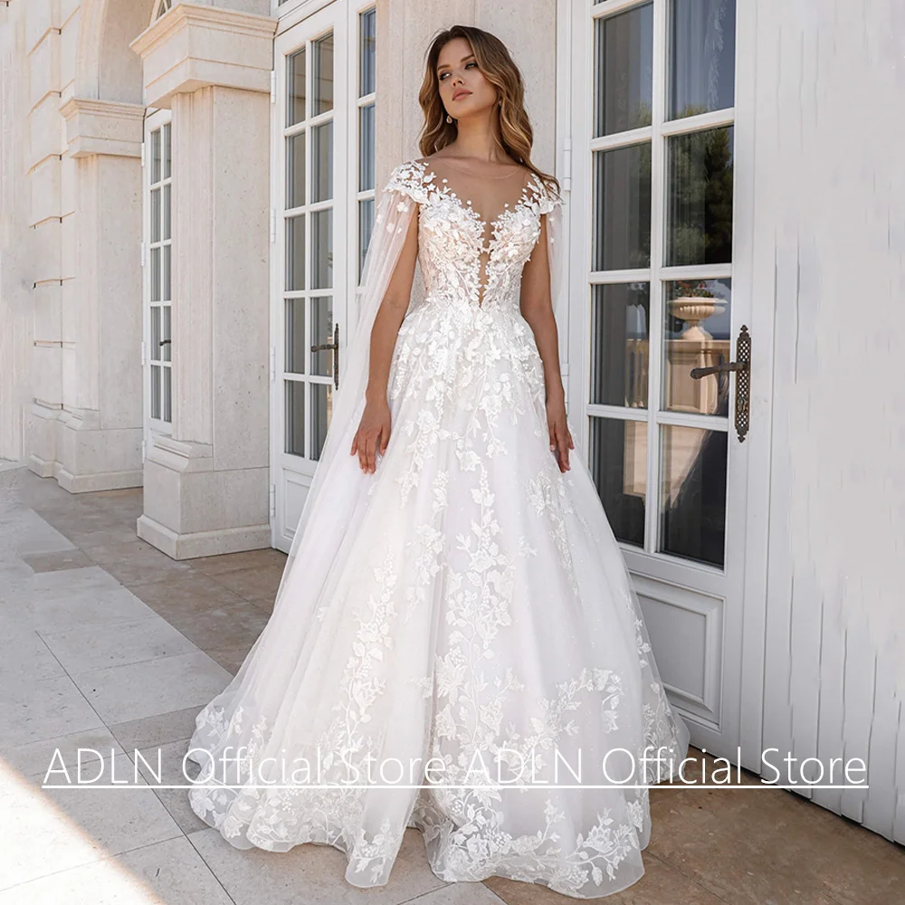 Robe de mariée avec cape à manches personnalisées