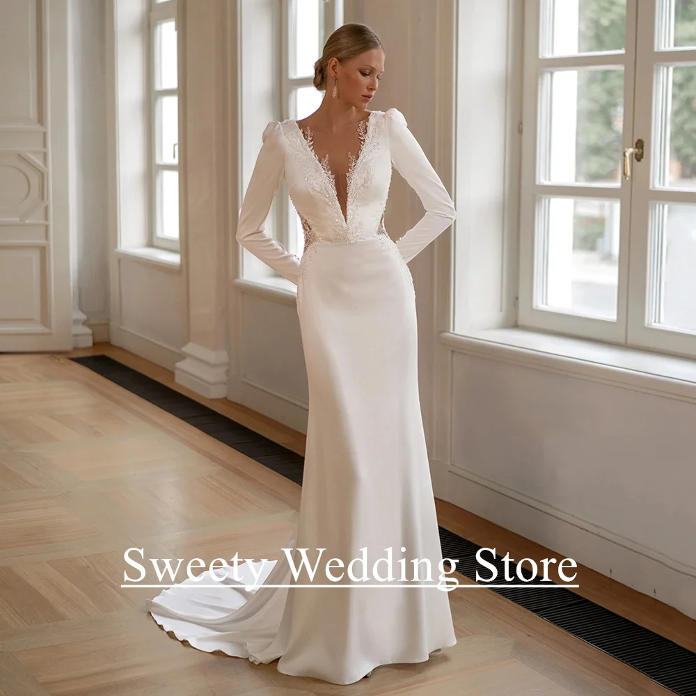 Robe de mariée sirène sexy personnalisée avec col en V profond, manches longues, appliques de perles et train de balayage pour cérémonie de mariage et occasions spéciales